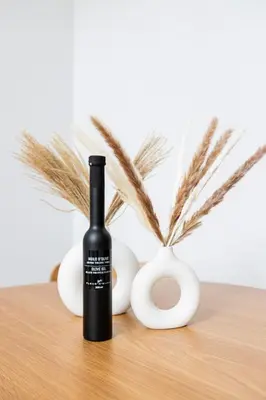 a bottle of wine sitting on a table with eggs at Le Mile End by M11 - 2 BDR Loft with Sofa Bed in Montréal
