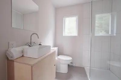 a bathroom with a sink and a toilet and a shower at Chalet 1 OST Shefford in Shefford