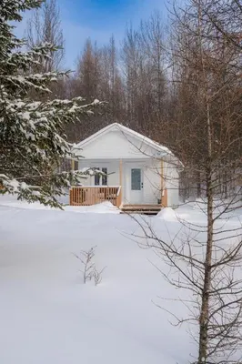 a house with snow in front of it at Chalet 1 OST Shefford in Shefford