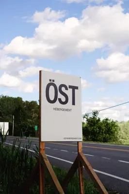 a sign on the side of a road at Chalet 2 OST Shefford in Shefford