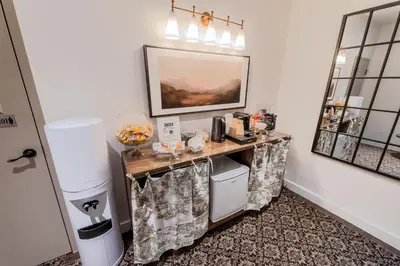 a room with a table in a room at Self Check-In Boutique Hotel - Quartier latin - Room 101 in Montréal