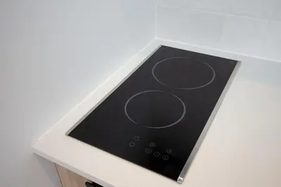 a stove top with circles on it on a counter at Studio #18 - Self Check-In - Plateau - St-Denis in Montréal
