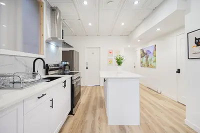 a kitchen with white cabinets and a white counter top at Room n1-Apartment 1 in a SHARED apartment in downtown Montreal in Montréal