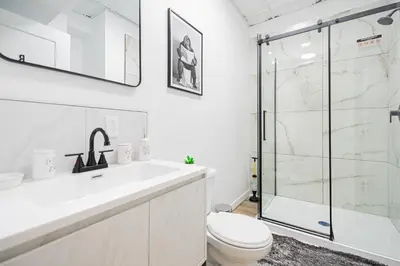 a bathroom with a shower and a toilet and a sink at Room n6-Apartment 1 in a SHARED apartment in downtown Montreal in Montréal