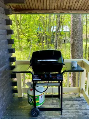 a grill sitting on a table on a patio at chalet 2 - Domaine de l'Archipel in Sorel