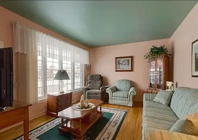 a living room with a couch and a table at 2beds in Room A Free parking 15min to downtown in Longueuil