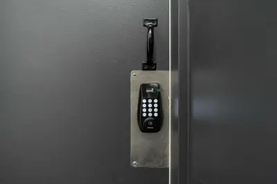a door with a remote control attached to it at Weekly cozy Studio For 2 Guest With Free parking in Montréal