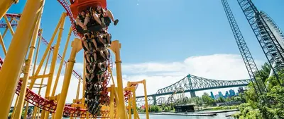 a roller coaster with a bridge in the background at Special Stays! Ultimate Destination for Montreal & West Island with Fast Wi-Fi in Montréal