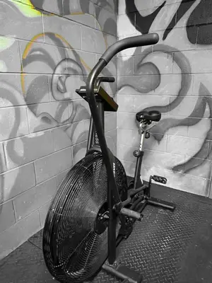 a bike parked in front of a wall with graffiti at 214 - Boho Ambiance Designer 2BR with Gym,Prking,DT&Airport in Montréal